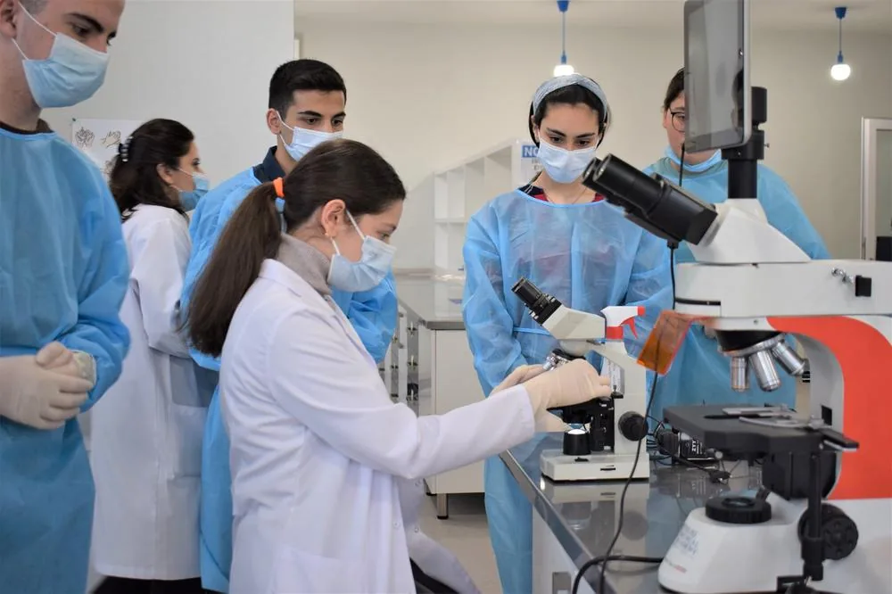A research class with microscopes at Petre Shotadze Tbilisi Medical Academy